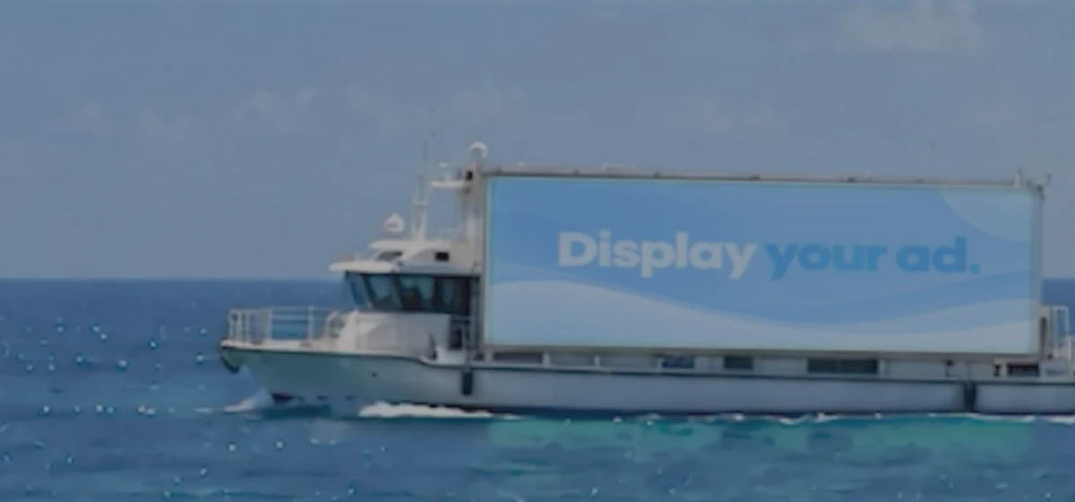 AdVoyage boat with a Display your ad banner off Miami Beach